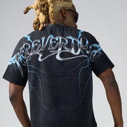 Person wearing a black t-shirt with 'REVERDY' design on the back against a gray background