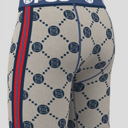 Beige boxer briefs with blue and red pattern and 'PSD' branding on a gray background