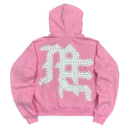 Pink hoodie with white floral pattern on the back against a white background