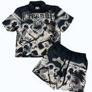 Black and white graphic t-shirt and shorts set with skeleton design on a white background