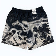 Black shorts with skeleton design on a white background