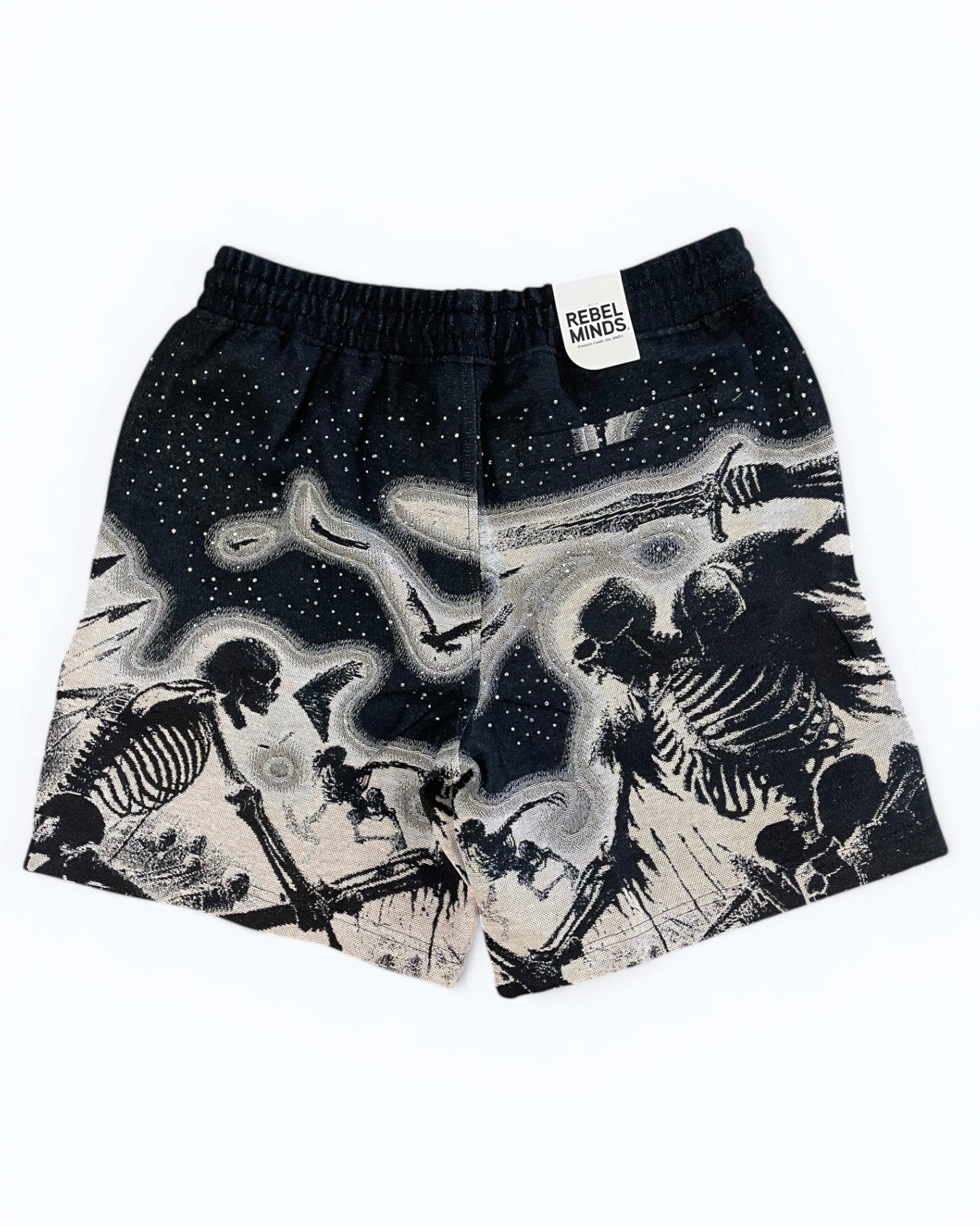 Black shorts with skeleton design on a white background