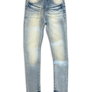 Light blue distressed skinny jeans with a faded yellowish-tan wash on the thighs, shown flat against a white background. The brand name 'GATH' is visible on the black waistband label.