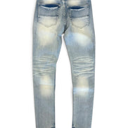 Light blue distressed skinny jeans shown from the back, featuring faded wash details and a black leather patch at the back waistband, set against a plain white background.