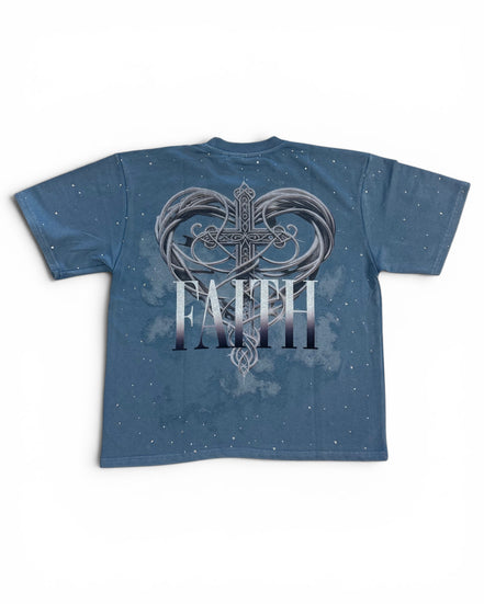 Blue t-shirt with a heart and cross design and the word 'FAITH' on a white background