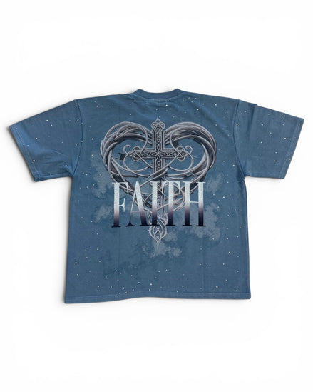 Blue t-shirt with a heart and cross design and the word 'FAITH' on a white background