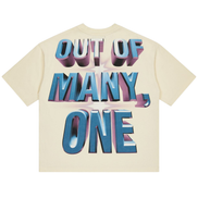 Beige t-shirt with colorful 'OUT OF MANY, ONE' text design on a white background