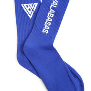 Blue socks with a logo and text on a white background