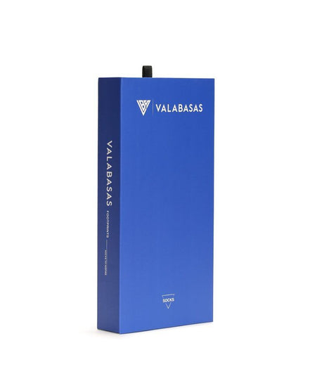 Blue box with 'VALABASAS' branding on a white background