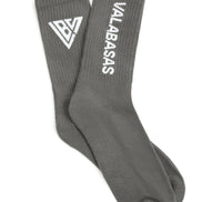 Gray socks with a logo and text on a white background