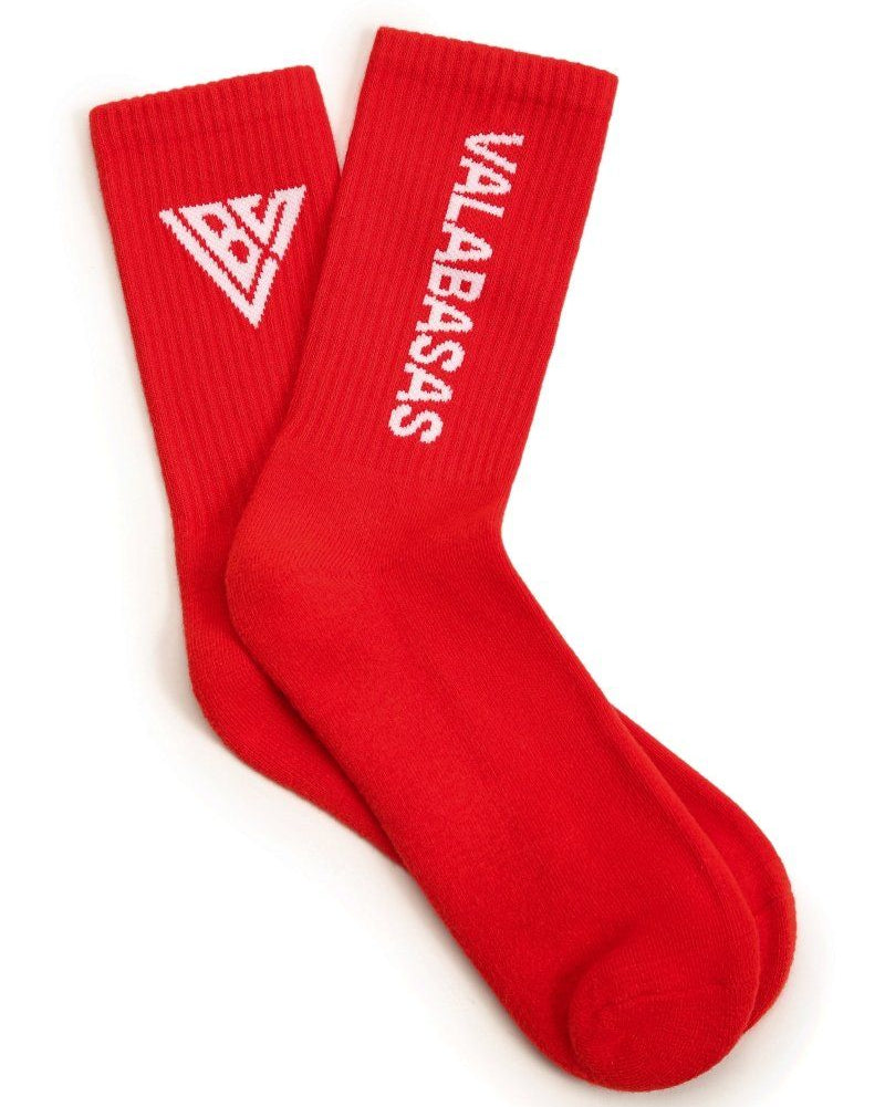 Red socks with white logo and text on a white background