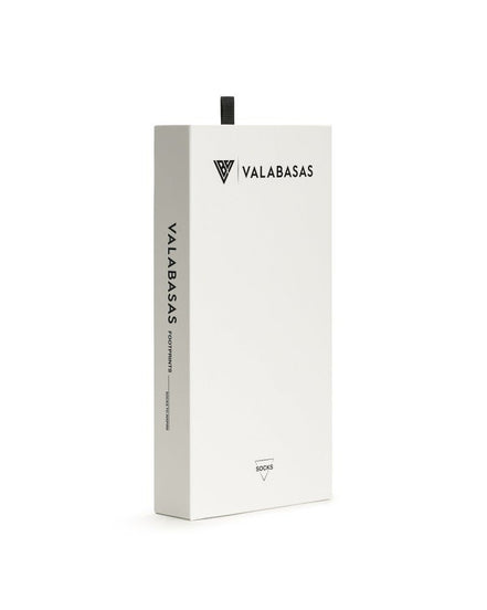 White box with 'VALABASAS' branding on a white background