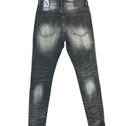Back view of a pair of dark gray washed skinny jeans with a faded black finish, showing the back pockets and a brand patch on the waistband.