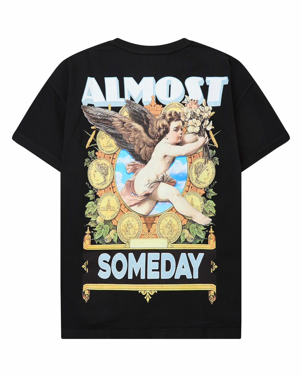 Black t-shirt with angel graphic and 'Almost Someday' text on a white background