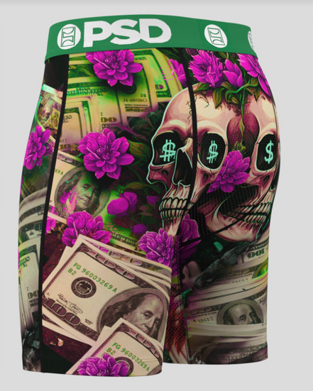 Shorts with a skull and dollar bill design on a gray background