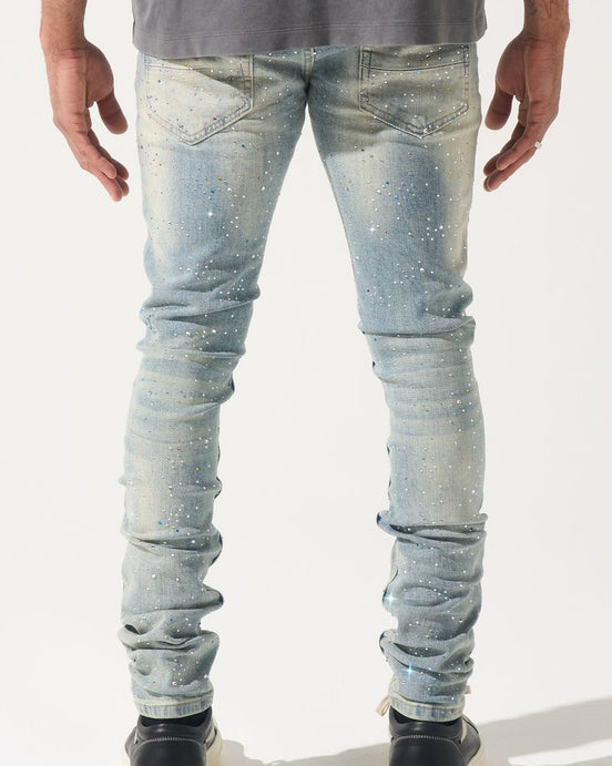 Light blue jeans worn by a person on a white background