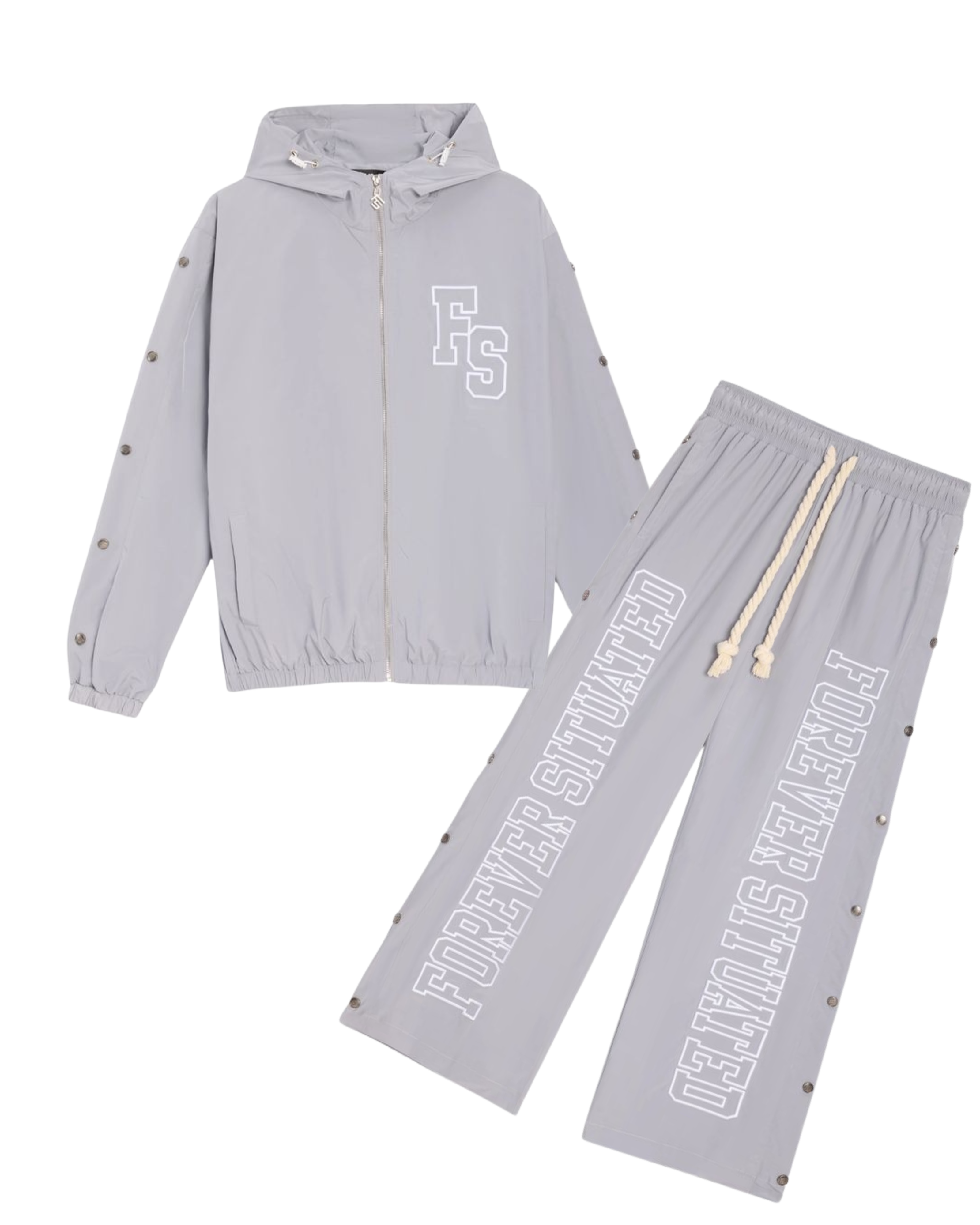 A two-piece light gray tracksuit set featuring a zip-up hooded jacket and matching drawstring pants. The jacket has a white 'FS' monogram on the chest, and the pants feature 'FOREVER SITUATED' printed vertically in white on one leg.