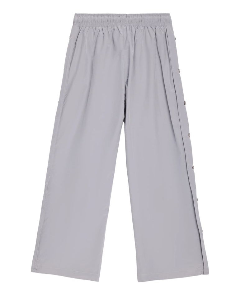 Light gray wide-leg cropped pants with an elastic waistband and decorative side buttons, shown flat on a white background.