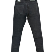 Black denim jeans shown from the back, featuring a dark wash with subtle whiskering and a visible ANOM brand patch on the back waistband.