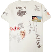 An off-white graphic t-shirt featuring various artistic prints, including dice, lips, sketches, and text like 'The Art of Not Explaining' and 'ENJOY THE SILENCE'.