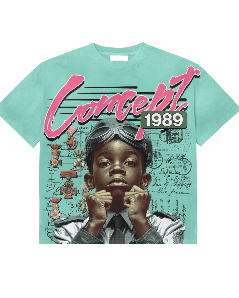 T-shirt with a graphic design of a child wearing a helmet and text 'Concept 1989' on a light blue background.