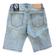 Back view of light blue denim shorts with brand labels on a white background
