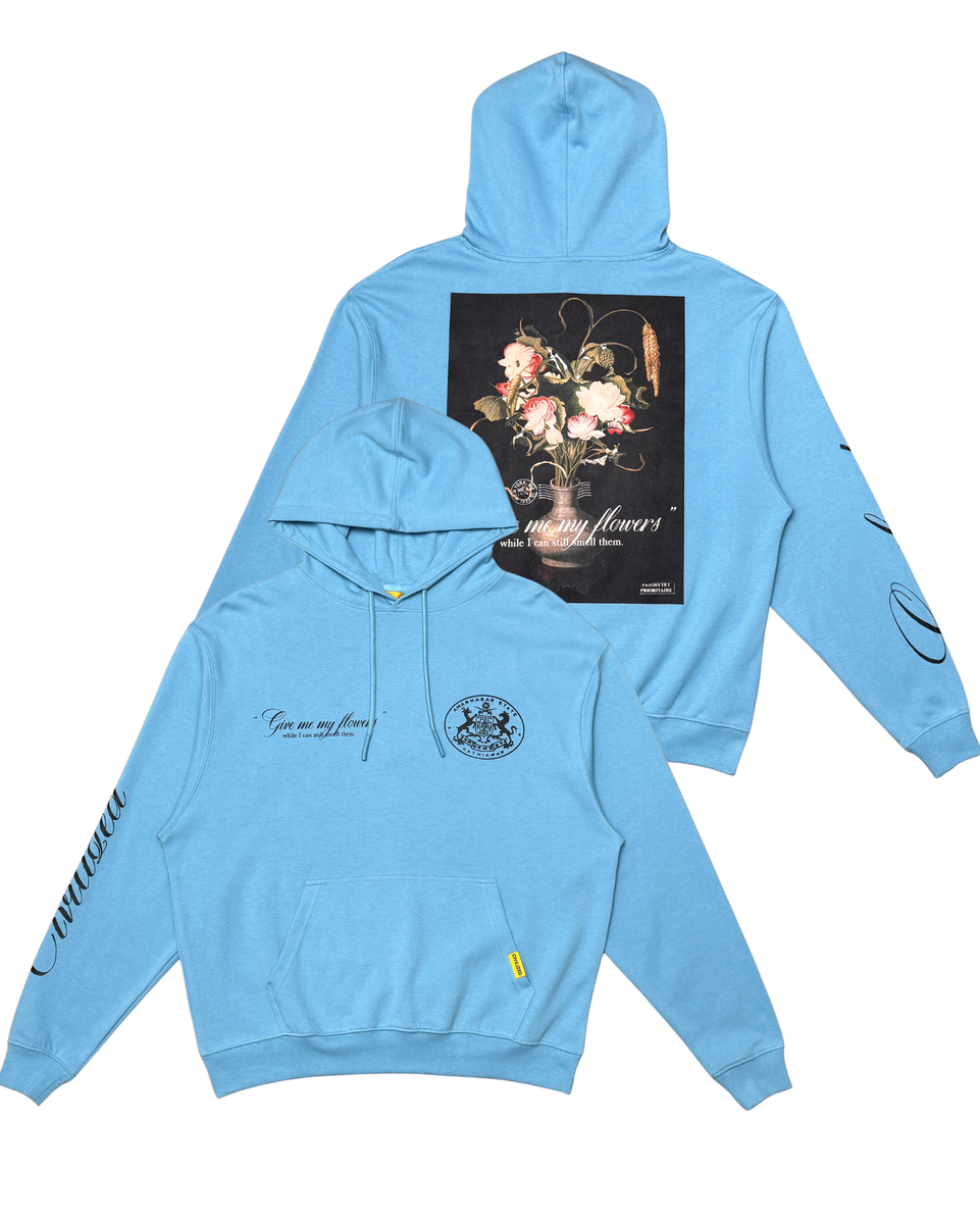 Light blue hoodie with floral design on the back on a white background