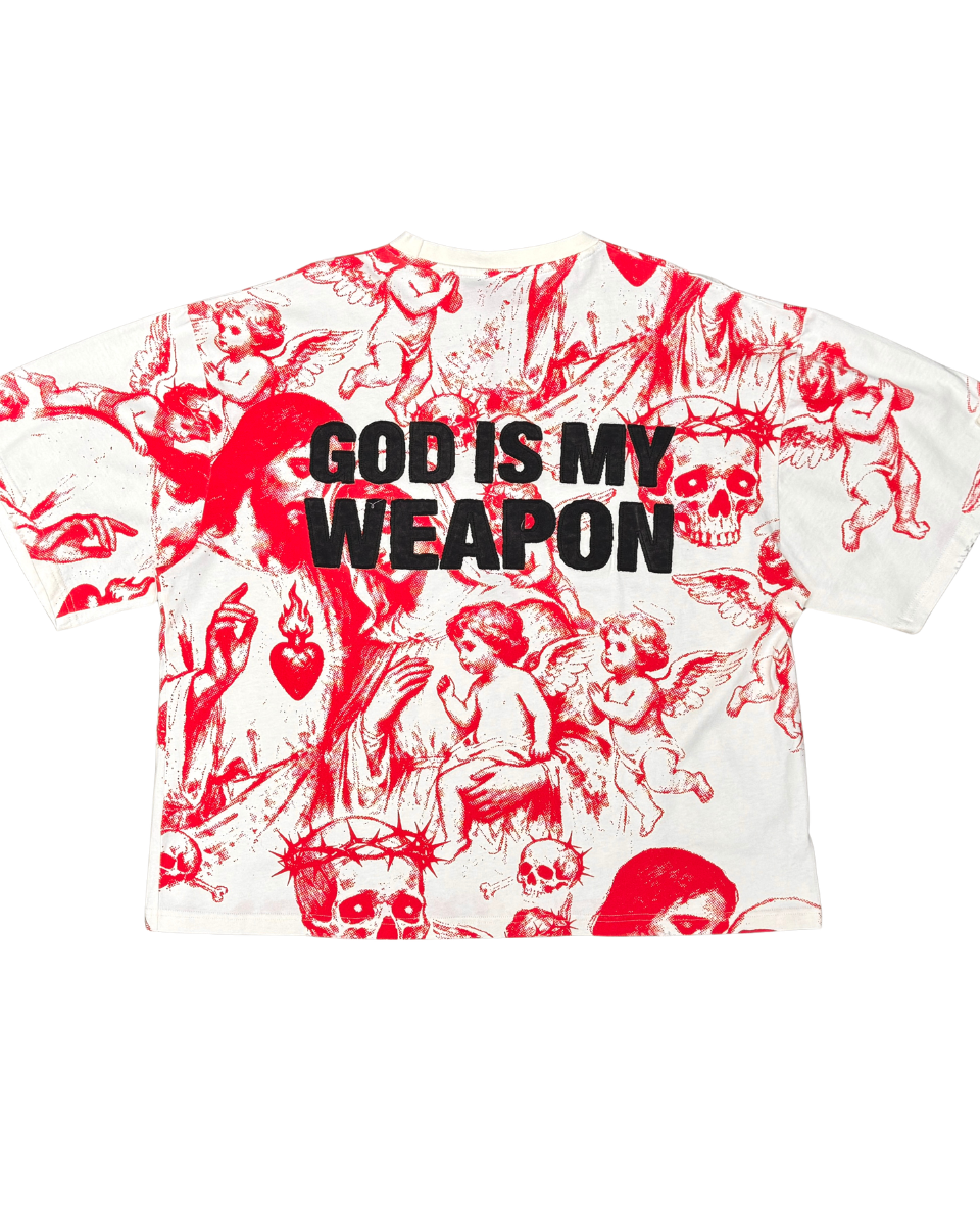 T-shirt with red and black graphic design and 'GOD IS MY WEAPON' text on a white background