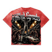 A red short-sleeve graphic t-shirt featuring a horror-themed print with the text 'Vtilted Sports' in a gothic font, a race car, and a figure standing atop it against a dark background.