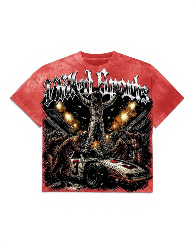 A red short-sleeve graphic t-shirt featuring a horror-themed print with the text 'Vtilted Sports' in a gothic font, a race car, and a figure standing atop it against a dark background.