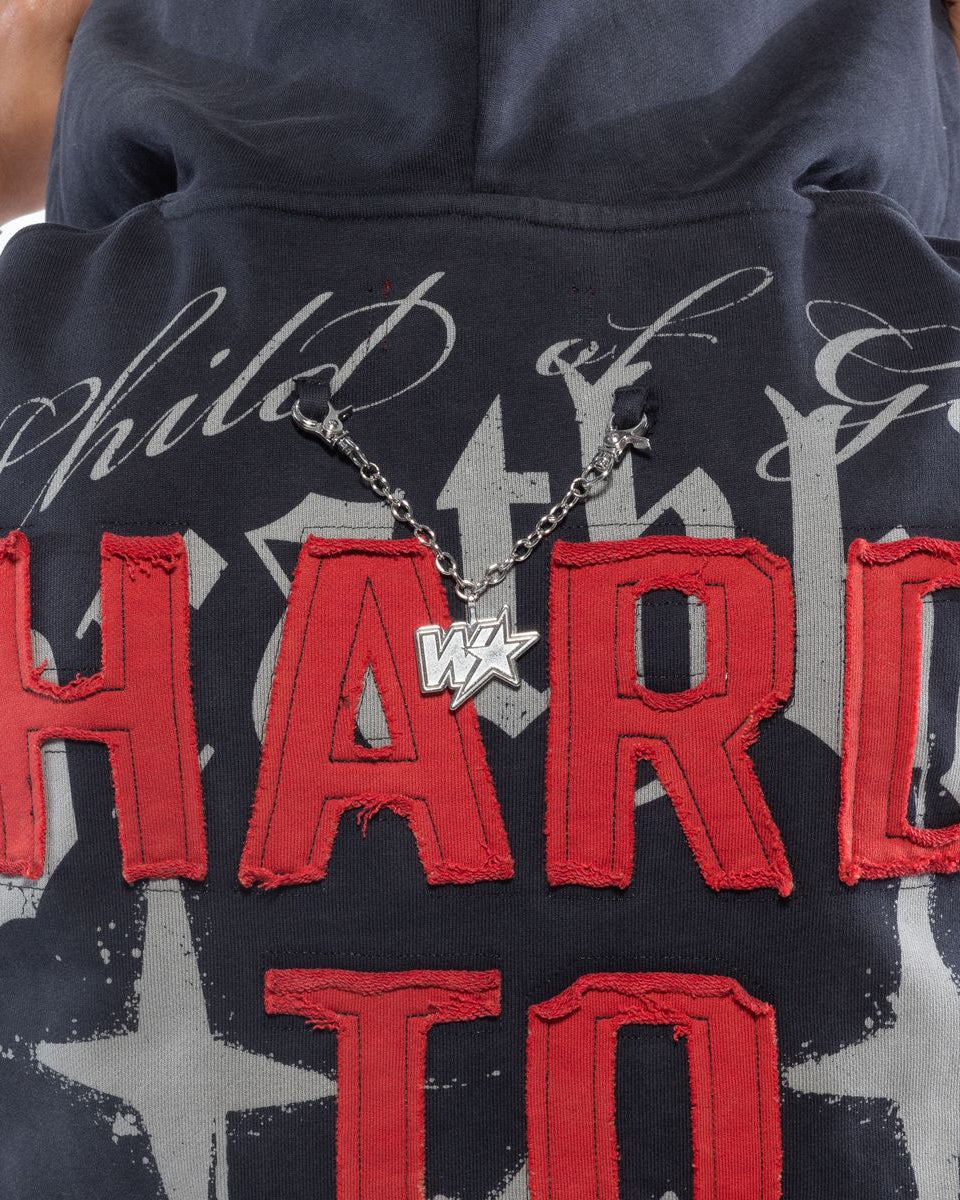 Black jacket with red text and 'WW' logo on a person wearing it.