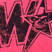 A close-up of a graphic print featuring a black distressed skull inside a star outline, set against a vibrant red wash background with a large black letter 'W' partially visible.