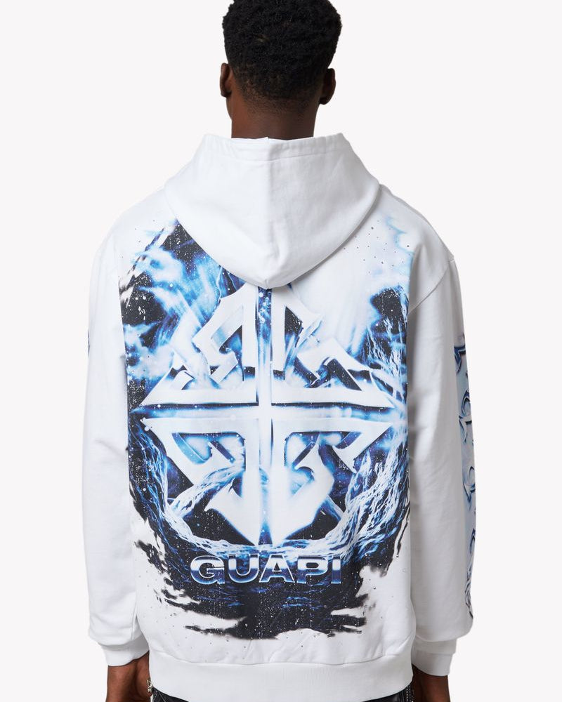 Person wearing a white hoodie with blue and black designs on the back, featuring the brand 'Gucci'.