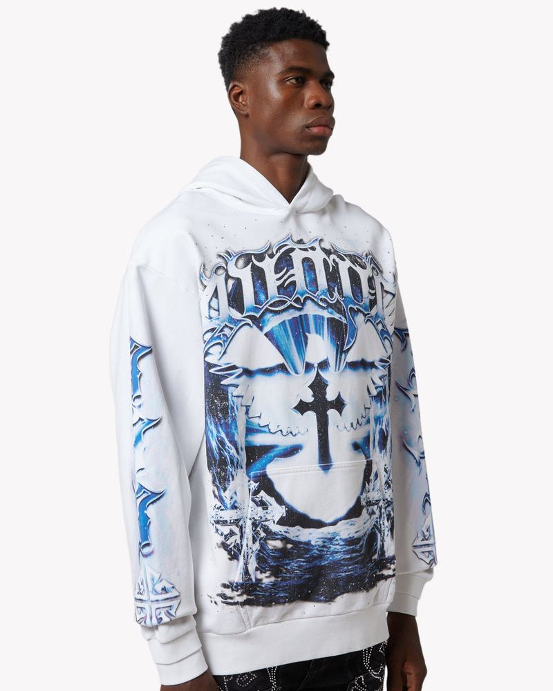 Person wearing a white hoodie with blue and black graphic design on a white background