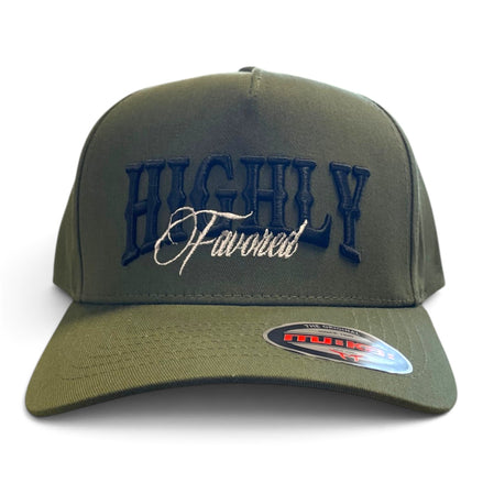 An olive green baseball cap with 'HIGHLY Favored' embroidered on the front in navy and white, featuring a curved brim with a visible Flexfit sticker.