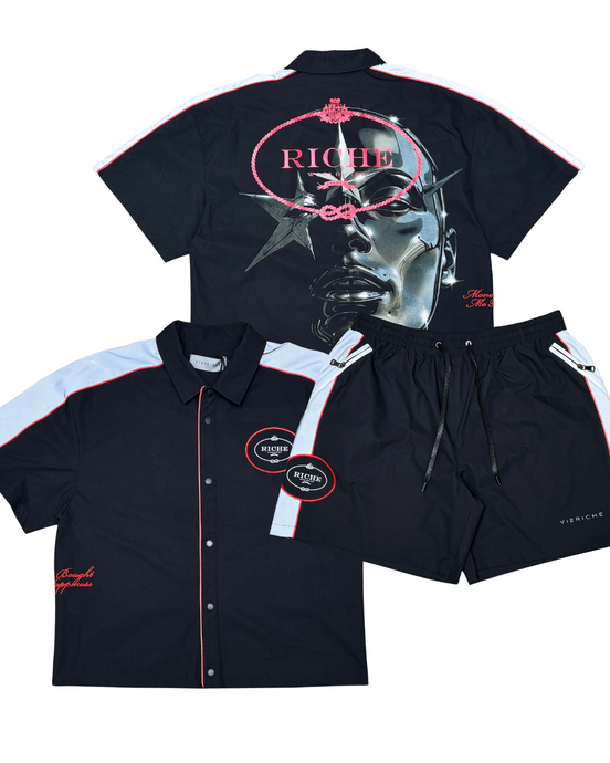 Black shirt and shorts set with graphic design and 'Riche' branding on a white background