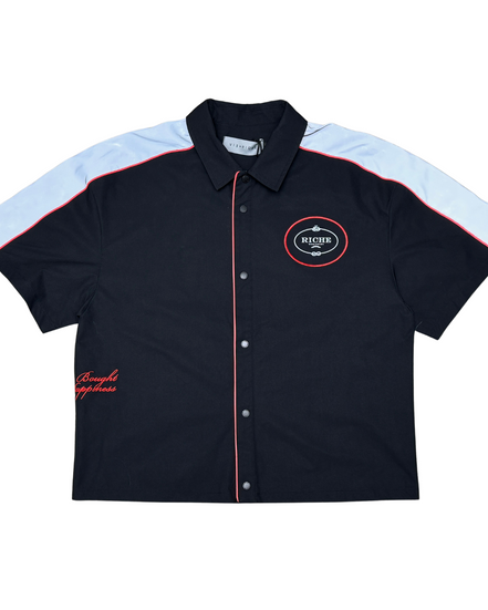 Black shirt with white sleeves and red accents on a white background