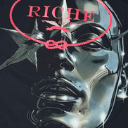 Black t-shirt with a metallic face design and 'Riche' text on a dark background