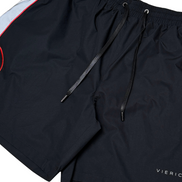 Black shorts with a brand logo on a white background