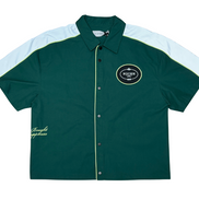 Green and white button-up shirt with a logo on a white background