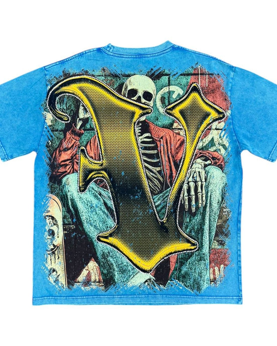 Blue t-shirt with a skeleton design and large yellow letter 'V' on a white background