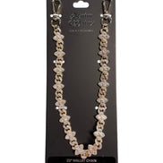Decorative wallet chain on a black card with branding.