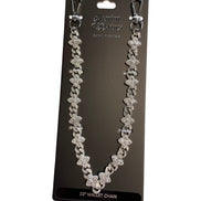Silver wallet chain on a black card with branding.