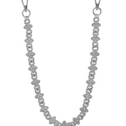 Silver chain strap with floral designs on a white background
