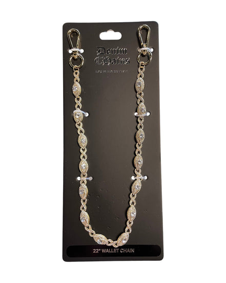 Gold wallet chain with clear stones on a black card with brand name.