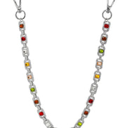 Pant chain with colorful gemstones on a white background