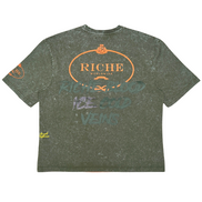 Green t-shirt with 'Riche' branding on a white background