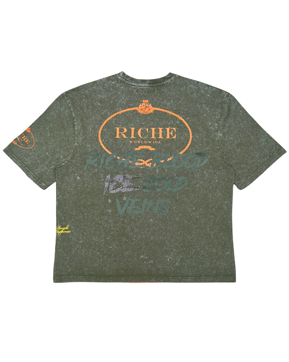 Green t-shirt with 'Riche' branding on a white background
