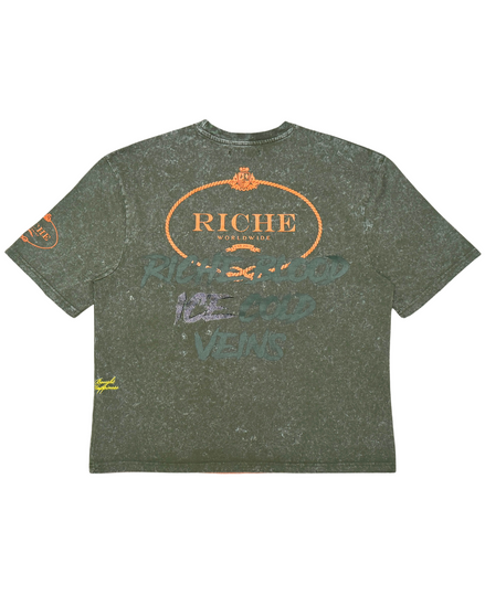 Green t-shirt with 'Riche' branding on a white background