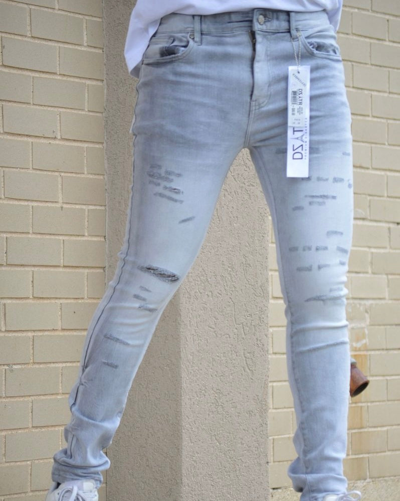 Knee Rip Distressed Slim Jean